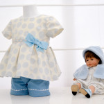 Conjunto para niña compuesto de casaca y pantalón corto en tonos azules